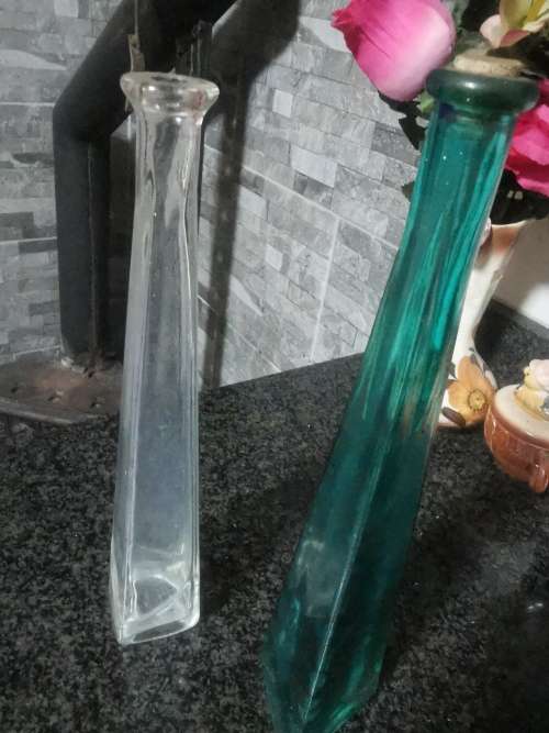 2 COLLECTABLE  GLASS BOTTLES
