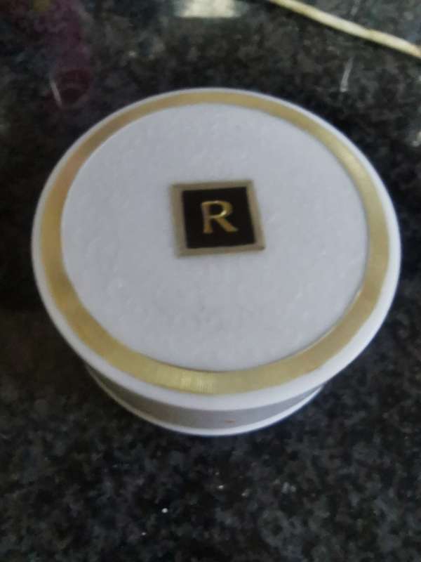 VINTAGE HARD PLASTIC POWDER TIN