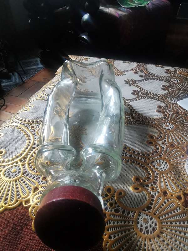 VINTAGE UNUSUAL ASHTRAY IN THE SHAPE OF A BOTTLE