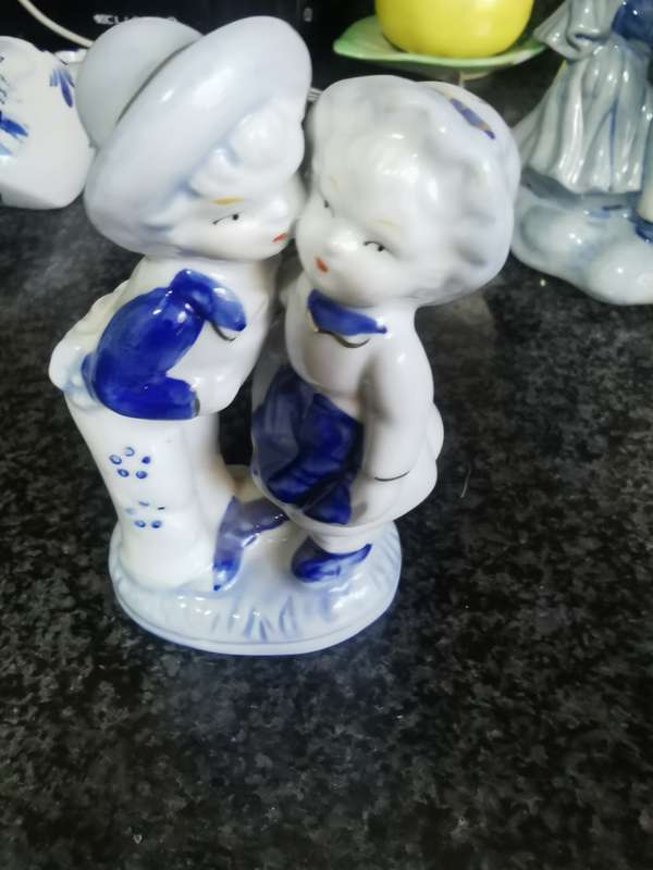 Vintage blue like delft boy and girl
