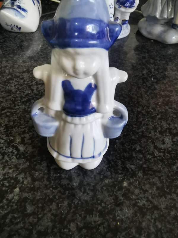 Vintage blue like delft girl with milk cans