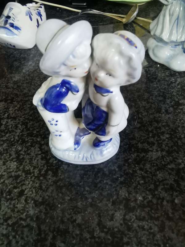 Vintage blue like delft girl with milk cans