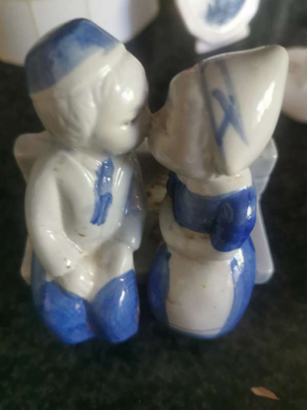 VINTAGE BOY AND GIRL ON COACH ORNAMENT