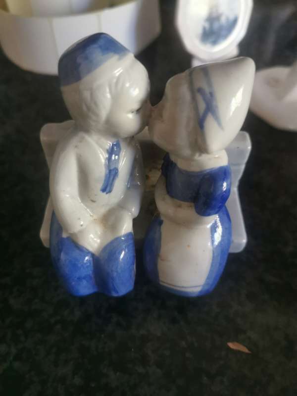 VINTAGE BOY AND GIRL ON COACH ORNAMENT