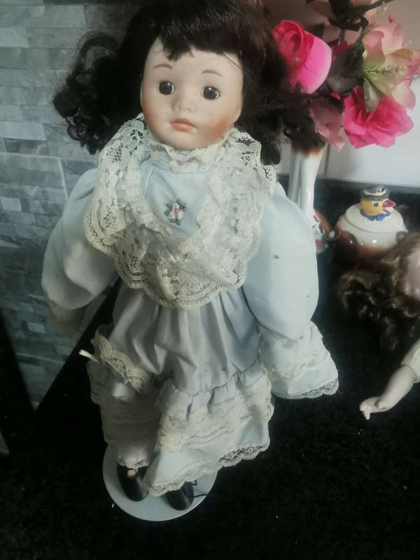 VINTAGE PORCELAIN DOLL ON STAND