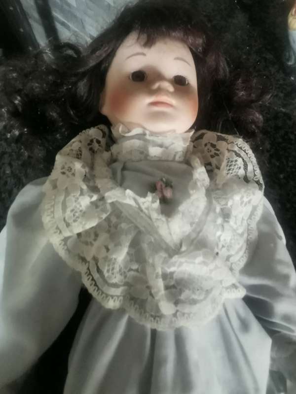 VINTAGE PORCELAIN DOLL ON STAND