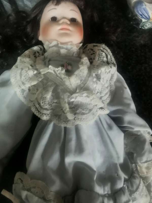 VINTAGE PORCELAIN DOLL ON STAND