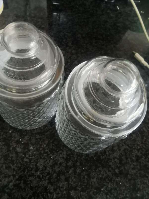 2 VINTAGE GLASS HOLDERS WITH LIDS