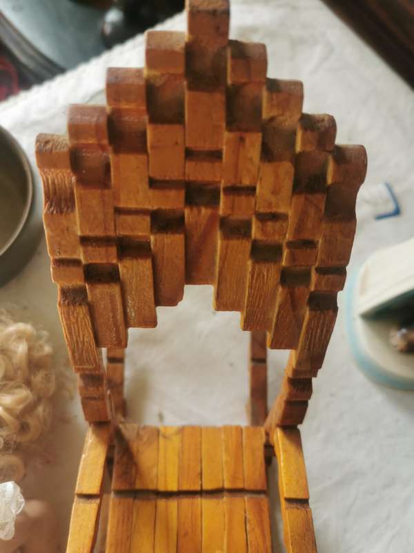 VINTAGE SMALL PORCELAIN DOLL ON ANTIQUE CHAIR