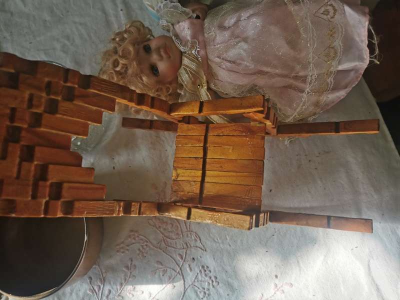 VINTAGE SMALL PORCELAIN DOLL ON ANTIQUE CHAIR