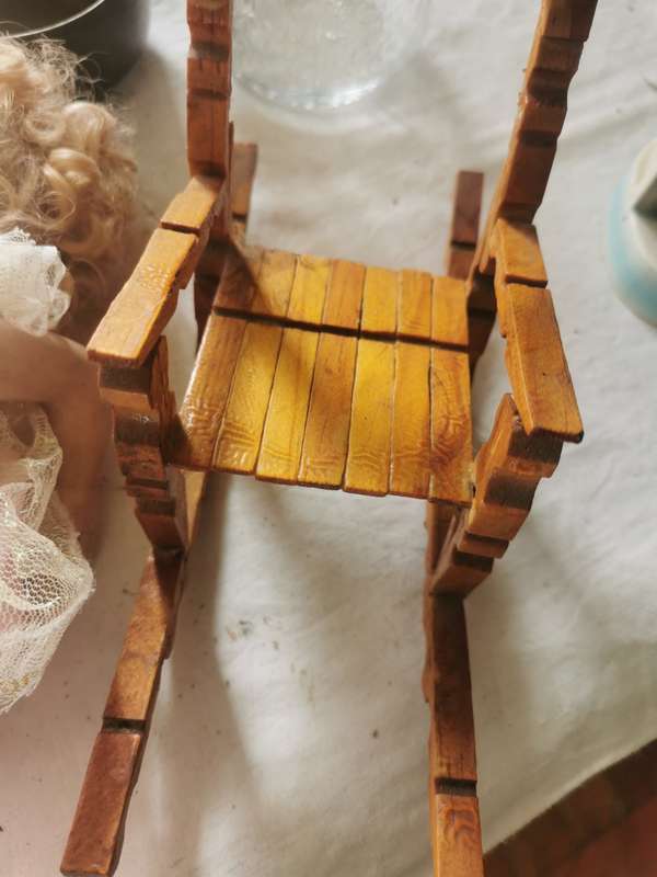 VINTAGE SMALL PORCELAIN DOLL ON ANTIQUE CHAIR