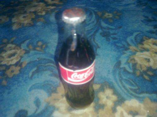 vintage coke bottle still  sealed