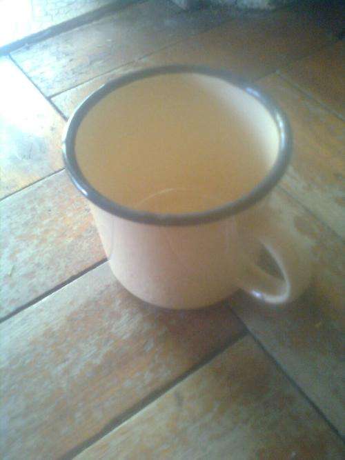 3  cream enamel mugs
