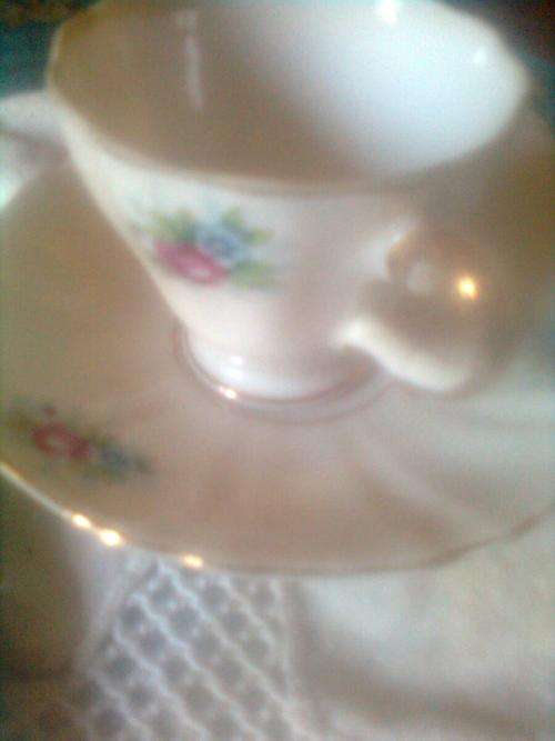 VINTAGE CUP AND SAUCER