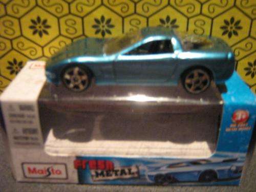 Chevrolette Corvette 97 (Scale 1/64) by Maisto