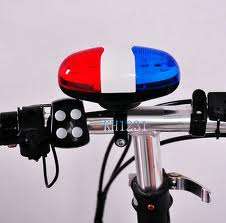 Bicycle Police light and siren! Great for kids play time and to warn motorists!