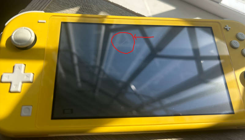 Nintendo Switch Lite (Yellow) with case  + Original UK Charger