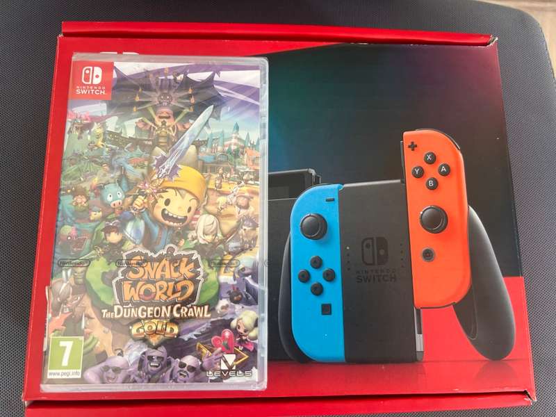 Nintendo Switch V2 Neon Red / Neon Blue + 1 Game