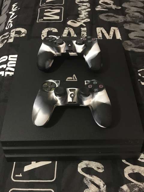 Used Sony PlayStation 4 PS4 Pro 1TB with 2 x controllers + 20 Games