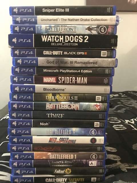 Used Sony PlayStation 4 PS4 Pro 1TB with 2 x controllers + 20 Games