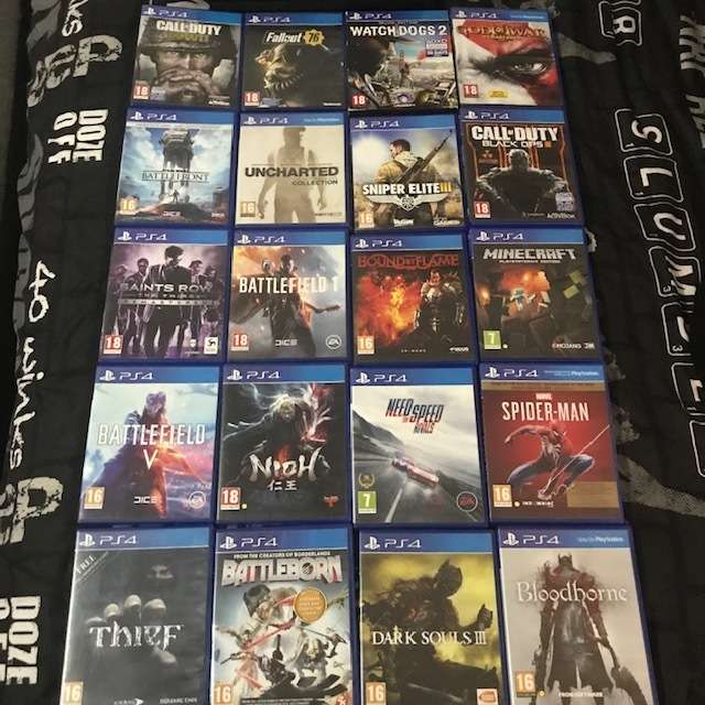 Used Sony PlayStation 4 PS4 Pro 1TB with 2 x controllers + 20 Games