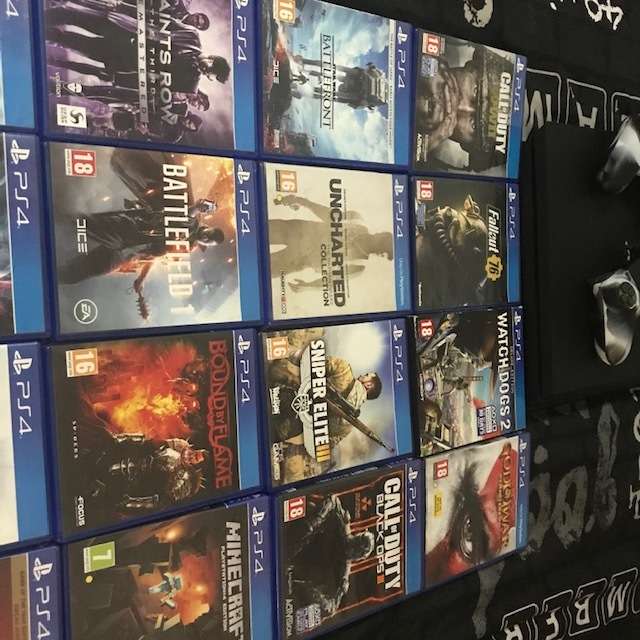 Used Sony PlayStation 4 PS4 Pro 1TB with 2 x controllers + 20 Games