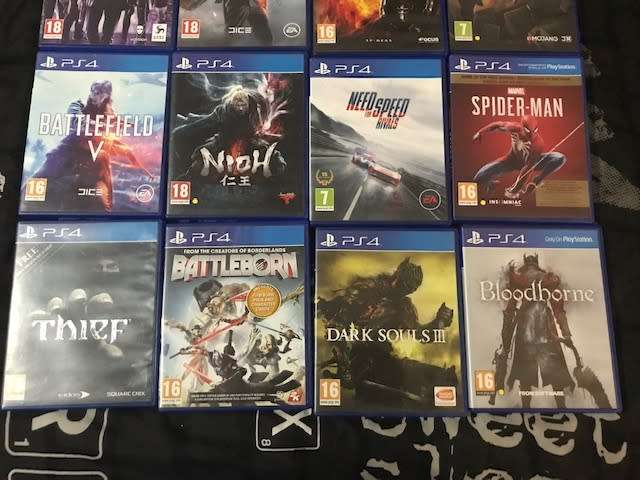 Used Sony PlayStation 4 PS4 Pro 1TB with 2 x controllers + 20 Games