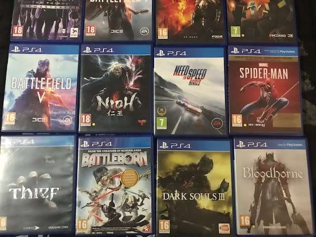 Used Sony PlayStation 4 PS4 Pro 1TB with 2 x controllers + 20 Games