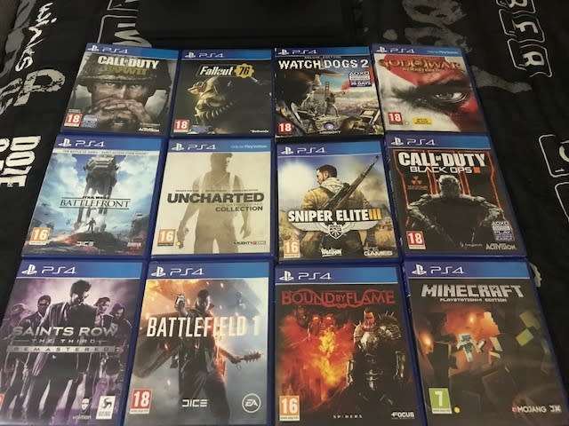 Used Sony PlayStation 4 PS4 Pro 1TB with 2 x controllers + 20 Games