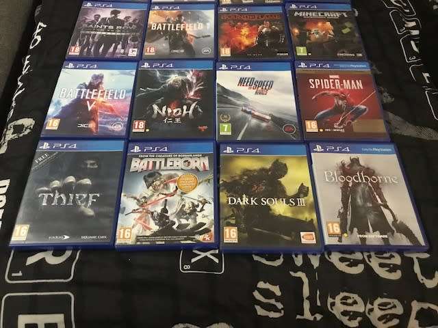 Used Sony PlayStation 4 PS4 Pro 1TB with 2 x controllers + 20 Games