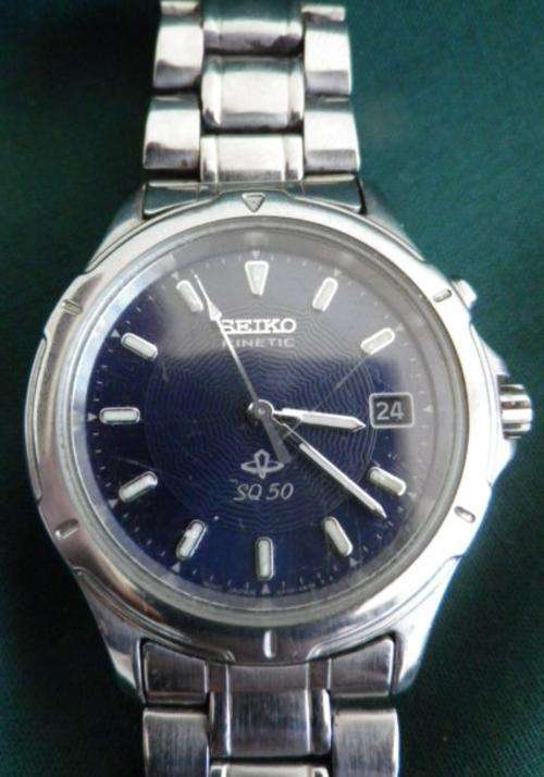 Vintage Seiko Kinetic SQ50 watch. With Leaflet. Great Condition. Works.
