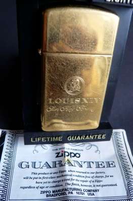 Genuine, Ladies size Zippo. Louis 1VX brandy Logo. Used