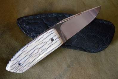 South Afican Knife Makers Guild. Hand made Knife. Fanie la Grange. Giraffe bone. Elephant hide sheat