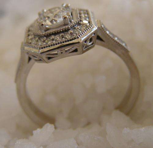9 CARAT WHITE GOLD,DIAMOND AND MOISSANITE RING