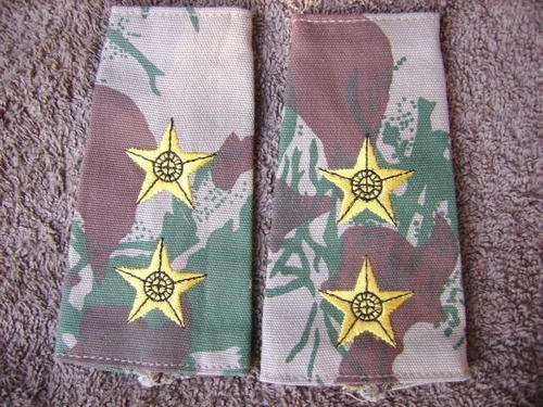 A PAIR OF KOEVOET(SPECIAL TASK FORCE)LIEUTENENT-SLIP ON EPAULETTES-LOW START.