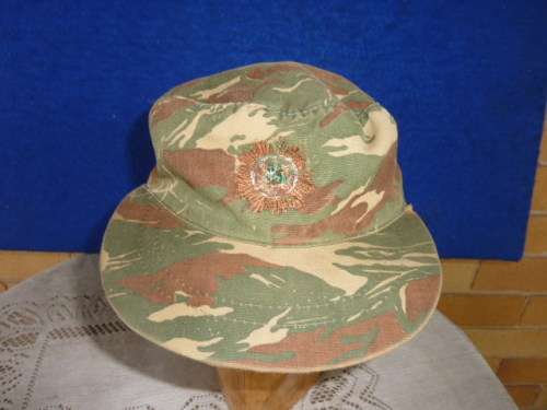 A) A SCARCE-KOEVOET(-SWAPOL)-CAMO FLAPCAP-SIZE 57-IN GOOD CONDITION-LOW START!