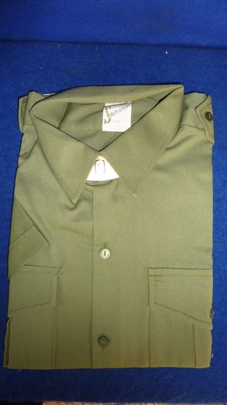 4B) 1970'S- RHODESIAN ARMY-OLIVE DRAPE-SHORT SLEEVE SHIRT-AS NEW-(STILL HAS CARDBOARD)-SIZE 41!