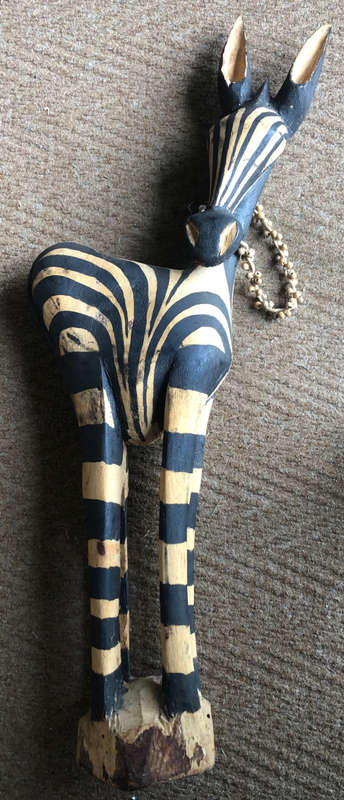 AFRICAN CARVING OF ZEBRA WITH BEADS AROUND THE NECK