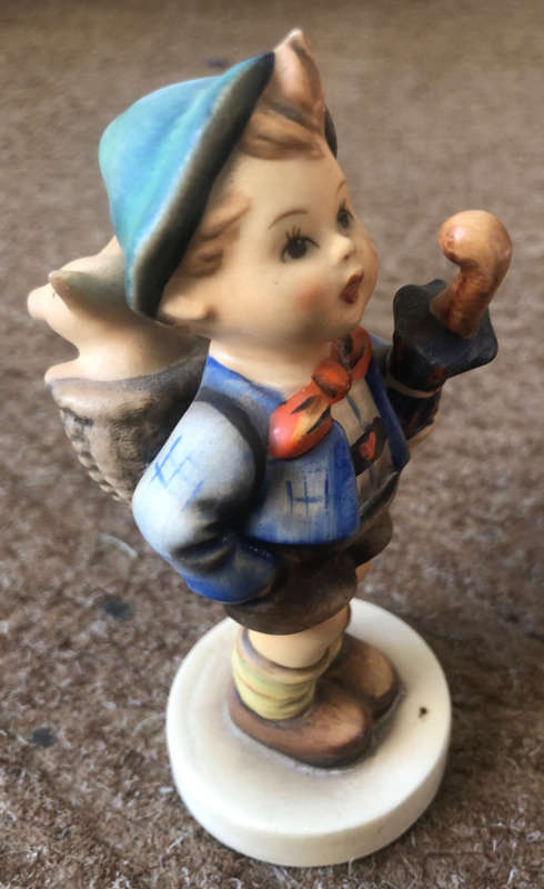 HUMMEL FIGURINE OF BOY WITH PIG AND UMBRELLA