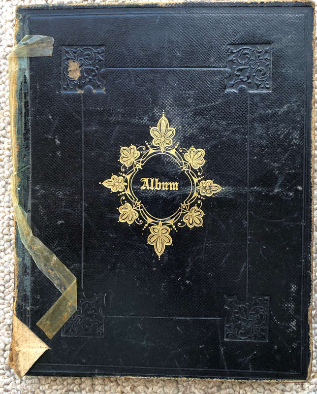 ALBUM CONTAINING QUEEN VICTORIA`S SIGNATURE, PENCIL DRAWINGS EMBOSSED STAMPS ET AL