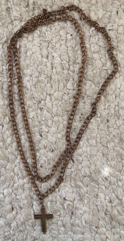 CRUCIFIX ON LONG CHAIN