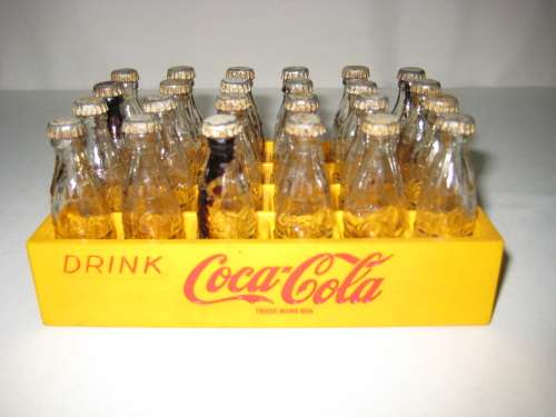 Coca-Cola 24 Miniatures Bottles with lids in Plastic crate