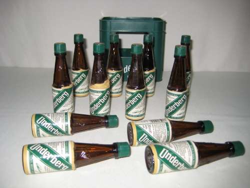 Underberg 12 Miniatures Bottles with lids in Plastic crate - After a good meal