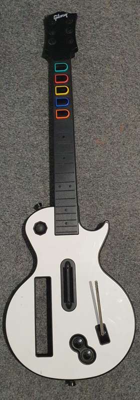 Nintendo Wii Bundle + 12 Games + Guitar Hero (Guitar) + Wii Manuals - [Good Condition]