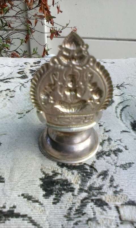 Silver coloured metal Hindu oil burner, stamped VBJ 925, 8cm high, small crack at the back.