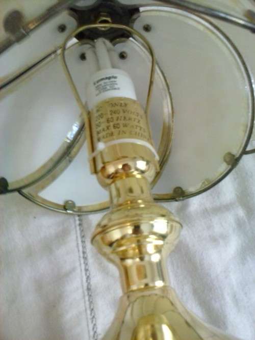 Tiffany-style electric lamp. Working fine, but shows a lot of use.