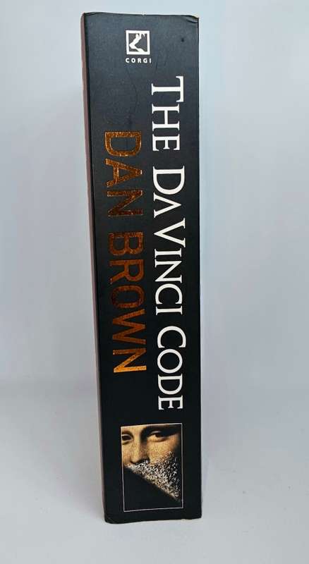The DaVinci Code by Dan Brown. Paperback. Published, 2003