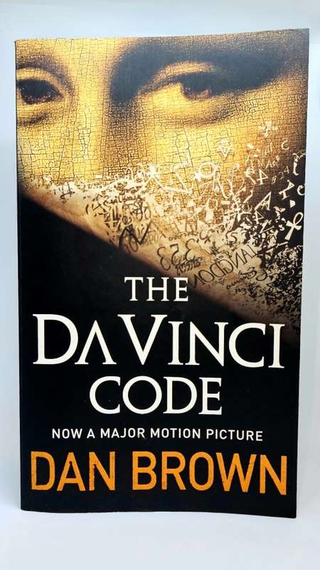 The DaVinci Code by Dan Brown. Paperback. Published, 2003