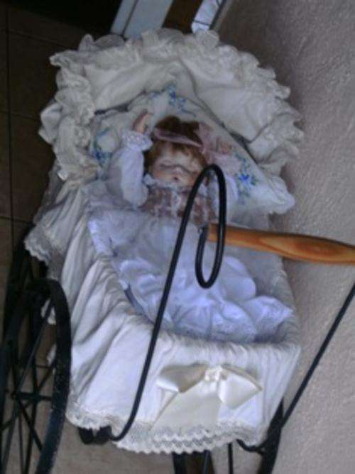 HANDMADE PORCELAIN DOLL IN OLD FASHIONED PRAM