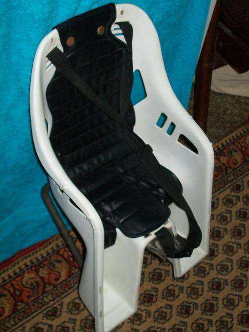 Baby/toddlers add-on bicycle seat with straps ESPECIALLY for those family rides.